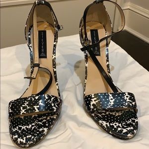 Back and white high heeled sandals